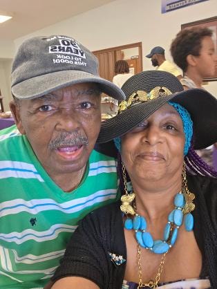 Al and a friend smiling together at the Church BBQ 2026 — MLK Memorial Baptist Church