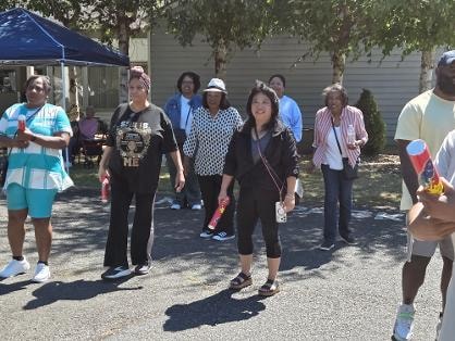 Church members enjoying the outdoors together at the Church BBQ 2026 — MLK Memorial Baptist Church