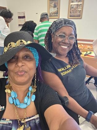 Crystal and friends smiling together at the Church BBQ 2026 — MLK Memorial Baptist Church