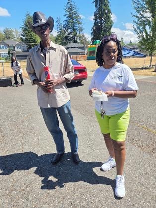 Two church members enjoying the outdoors at the Church BBQ 2026 — MLK Memorial Baptist Church