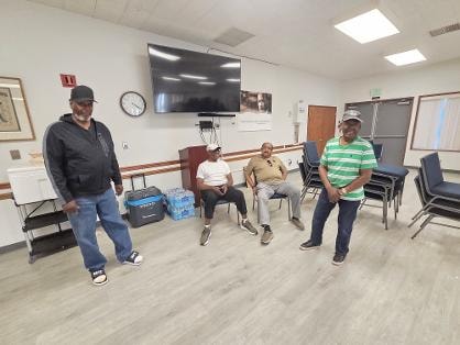 Men of the church fellowshipping together at the Church BBQ 2026 — MLK Memorial Baptist Church