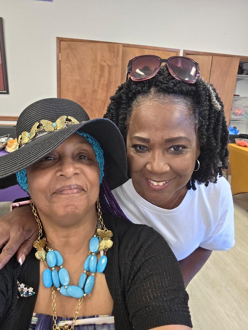 Purple and Cheryl smiling together at the Church BBQ 2026 — MLK Memorial Baptist Church