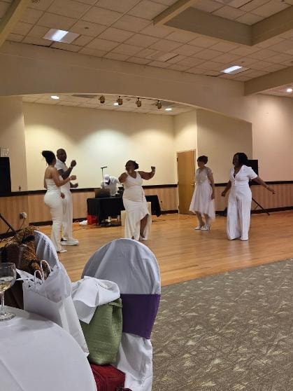 Guests in white attire dancing on the ballroom floor at the Golden Jubilee All-White Affair 2026