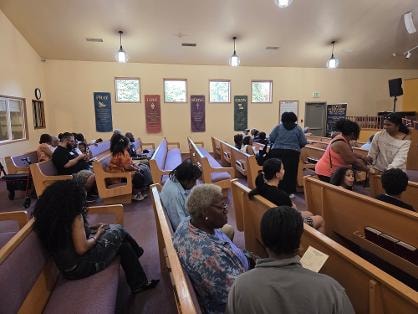 Children and adults gathered in the sanctuary — VBS Day 1