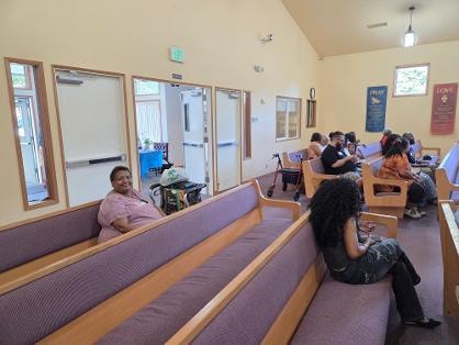 Congregation seated in pews — VBS Day 1