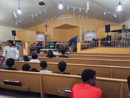 Wide view of sanctuary during VBS assembly — Day 1