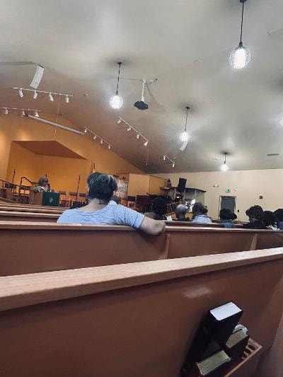 Congregation seated in pews — VBS Day 1