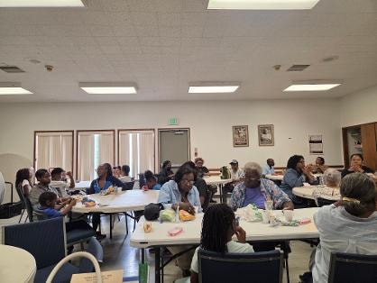 Fellowship dinner — full room of participants VBS Day 1