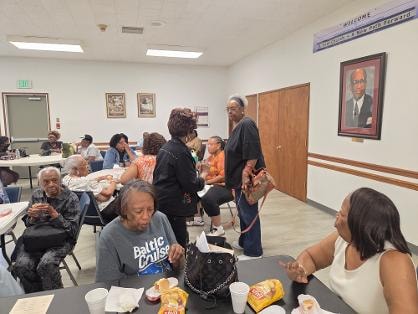 Fellowship dinner — group at round table VBS Day 1