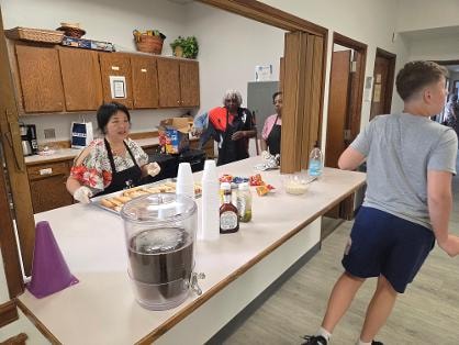 Fellowship dinner — full room dining VBS Day 1