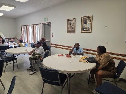 Fellowship dinner — youth at round tables VBS Day 1