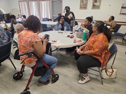 Fellowship dinner — congregation enjoying meal VBS Day 1