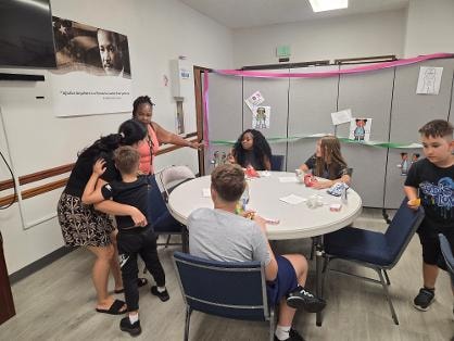 Fellowship dinner — members dining together VBS Day 1