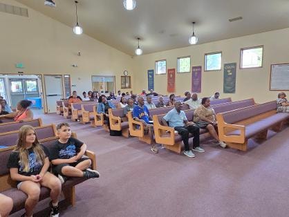Congregation seated in sanctuary — Day 1