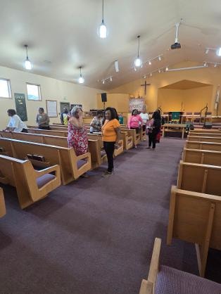 Congregation gathered in the sanctuary — VBS 2026 MLK Memorial Baptist Church